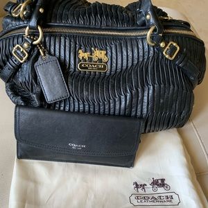 Black leather Coach purse and wallet